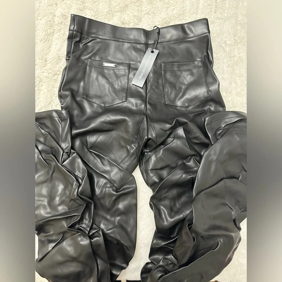 MANIERE DE VOIR - Tacked Vegan Leather Flared Trousers in Black - Picture 7 of 14